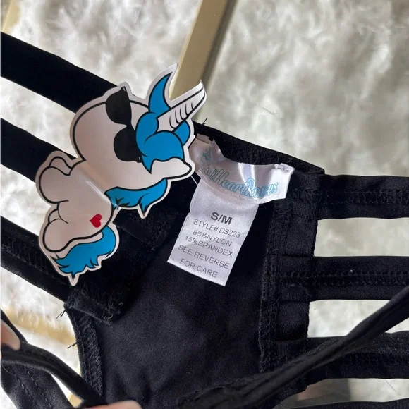 Iheartraves Black cut out bottoms 
Size S/M - Picture 3 of 4